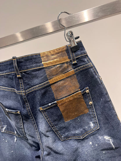 Denim torsion con roture e fascia dorata