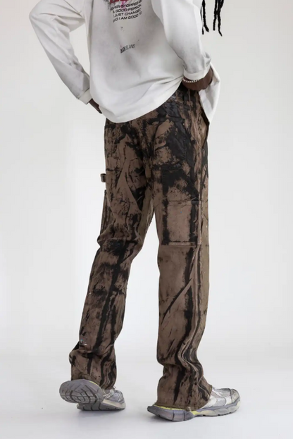 denim spalmato con borchie