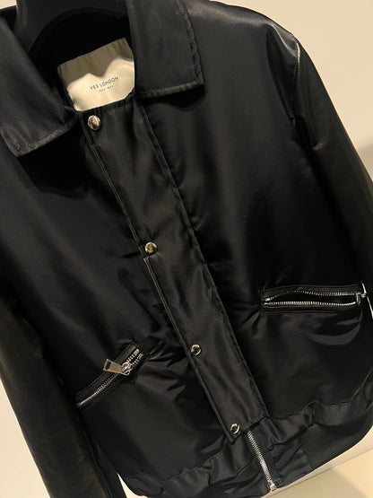 Bomber in nylon con maniche in pelle